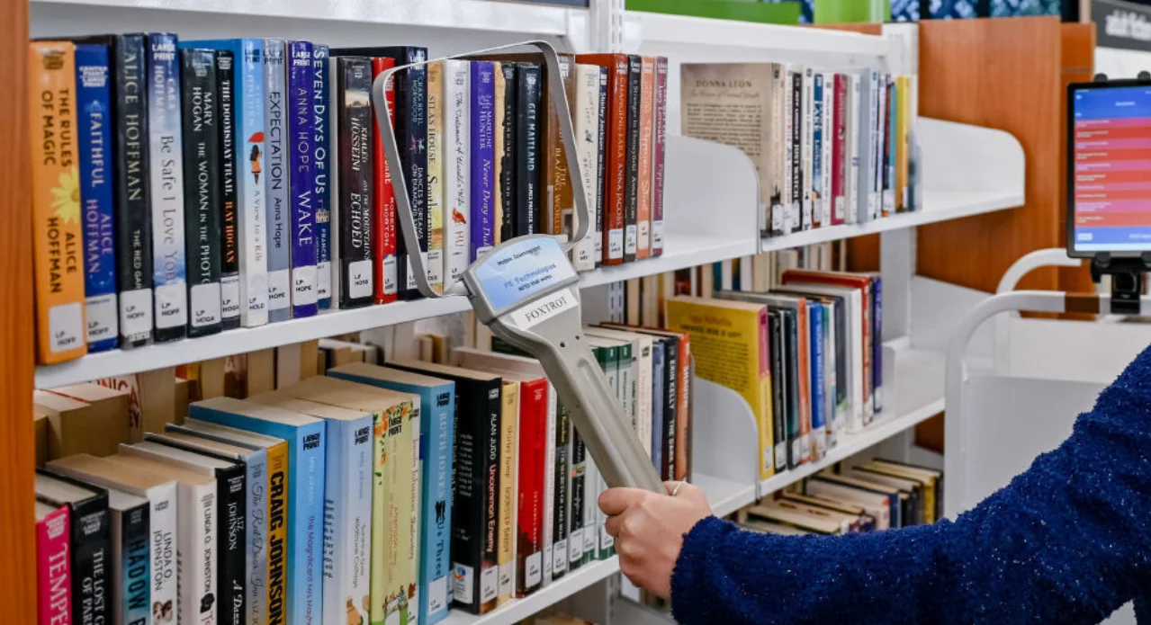 Live scanning wand being used in a university library